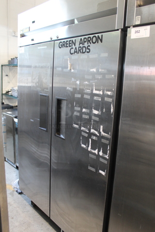 2015 True TG2R-2S ENERGY STAR Stainless Steel Commercial Two Door Reach In Cooler w/ Poly Coated Racks on Commercial Casters. 115 Volts, 1 Phase. Tested and Working!