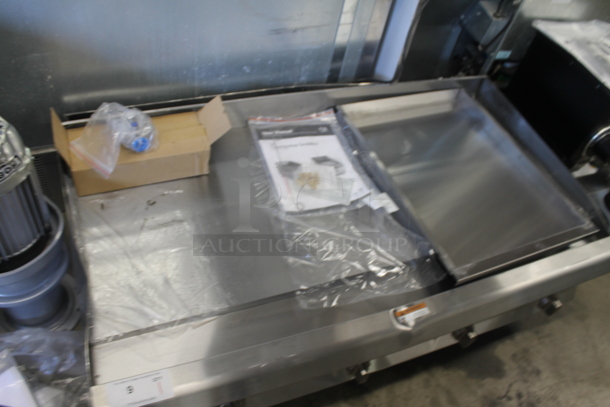 BRAND NEW SCRATCH AND DENT! CPG 351GTCPG Cooking Performance Group Commercial Stainless Steel Natural Gas 48" Countertop Griddle on Galvanized Legs. 120,000 BTU.   - Image 7 of 9