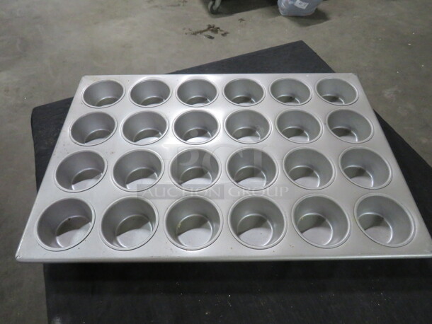 One 24 Hole Commercial Muffin Pan.  