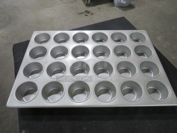 One 24 Hole Commercial Muffin Pan.   - Image 1 of 1