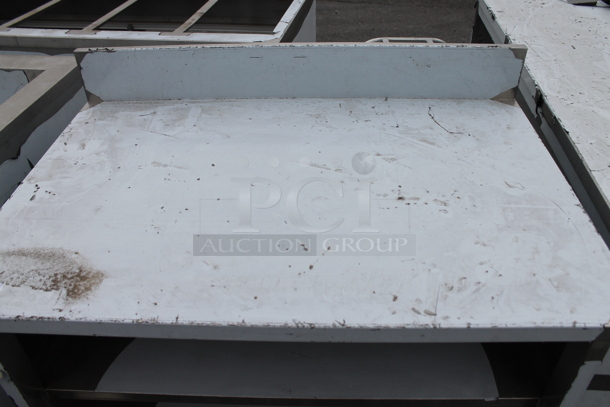 BRAND NEW SCRATCH AND DENT! Stainless Steel Table w/ Back Splash and 2 Under Shelves. - Image 2 of 5