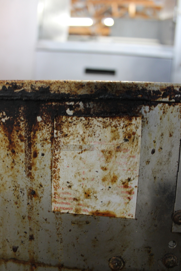 LATE MODEL! Garland Stainless Steel Commercial Countertop Natural Gas Powered 2 Tier 6 Burner Range. - Image 7 of 8