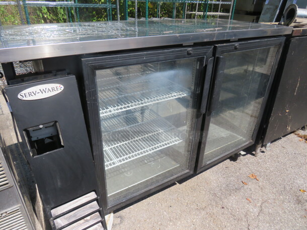 One Serveware 2 Door Back Bar Cooler With 2 Racks On Casters. Working, NOT Cold. 115 Volt. Model# BB6124G-USV. 61X25X45 - Image 1 of 2
