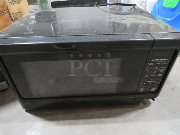 One Hamilton Beach Microwave. Model# P100N30AP-S3B1. 120 Volt. 21X15X12 - Image 1 of 1