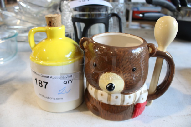 2 Various Ceramic Items; Bear Mug w/ Spoon and Jug w/ Cork. 6x4x6.5, 3.5x3.5x6. 2 Times Your Bid!