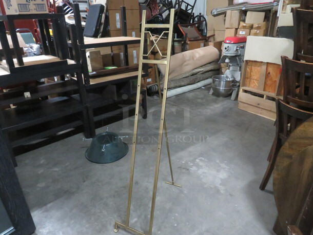 One 15X56 Gold Easel. - Image 1 of 2