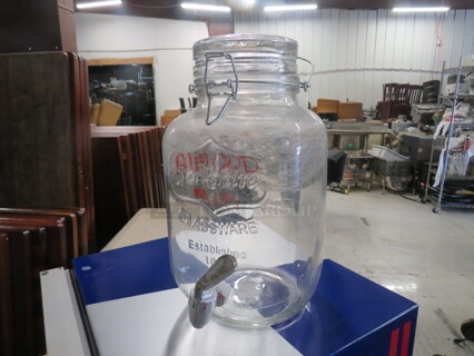 One Glass Beverage Dispenser With Lid And Spigot.