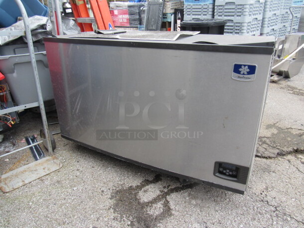 One Manitowic Ice Maker. Model# ID1402A. 208/230 Volt. 48X24X27. 