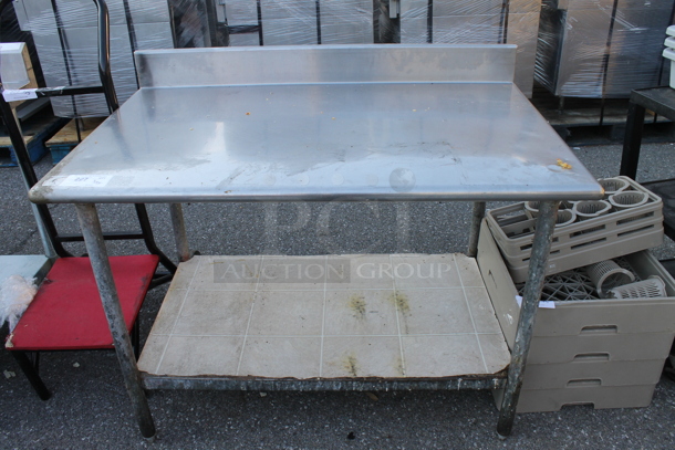 Stainless Steel Table w/ Back Splash and Under Shelf. - Image 1 of 4