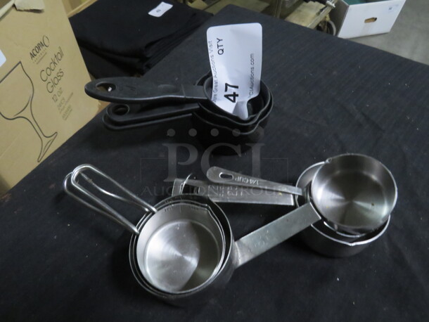 One Lot Of Assorted Measuring Cups.
