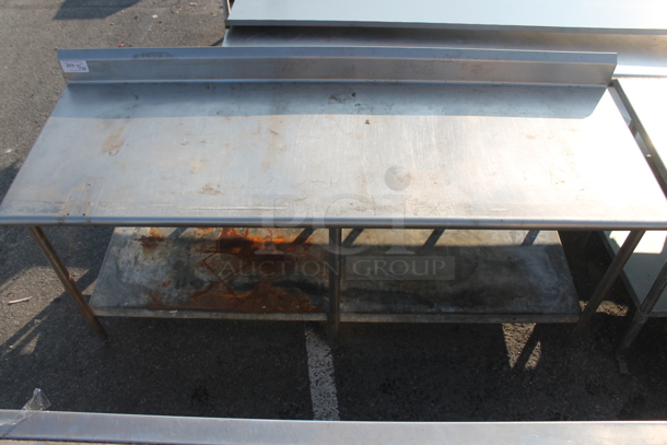 Stainless Steel Commercial Table w/ Back Splash and Under Shelf. - Image 1 of 3