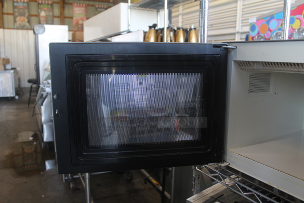 2010 Amana RCS10MPA Stainless Steel Commercial Countertop Microwave Oven. 120 Volts, 1 Phase.  - Image 6 of 8