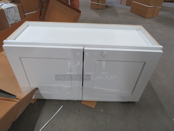 One NEW Echelon Maple 2 Door Wall Cabinet In An Alpine White Finish. #W3318BD.