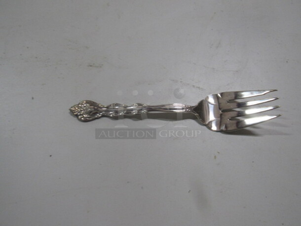 One Silver Serving Fork