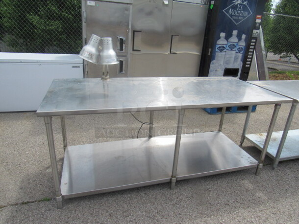 One Stainless Steel Table With Stainless Under Shelf, And 2 Adjustable Heat Lamps. 82.5X36X35