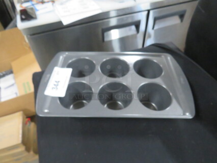 One NEW Wilton 6 Hole DEEP Muffin Pan.