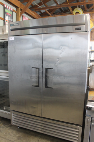 2016 True T-49F-HC Stainless Steel Commercial 2 Door Reach In Freezer w/ Poly Coated Racks on Commercial Casters. 115 Volts, 1 Phase. Tested and Working!