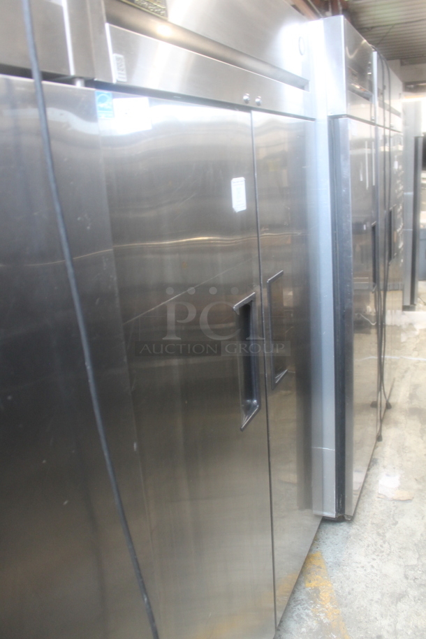 2014 True TG2R-2S ENERGY STAR Stainless Steel Commercial Two Door Reach In Cooler w/ Poly Coated Racks on Commercial Casters. 115 Volts, 1 Phase. Tested and Working! - Image 1 of 5