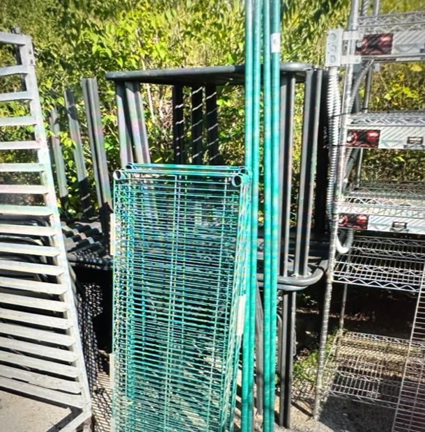 One Green Metro Shelf With 4 Poles And 4 Shelves. 48X18X74.5. Assembly Required. - Image 1 of 2