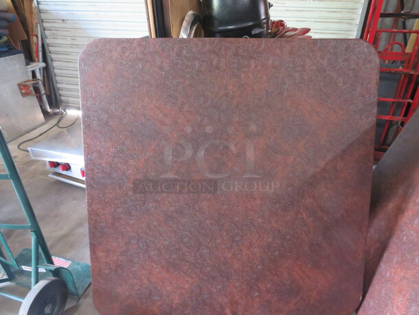 One Table Top Covered In Brown Leather Look Vinyl. 48X48