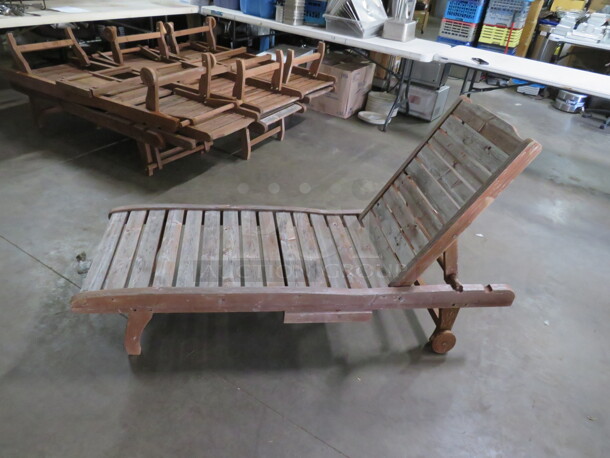 One Adjustable Wooden Chaise Lounger With 2 Wheels, And A Pullout Shelf. Needs A Lil Adjusting. 72X23 - Image 2 of 3