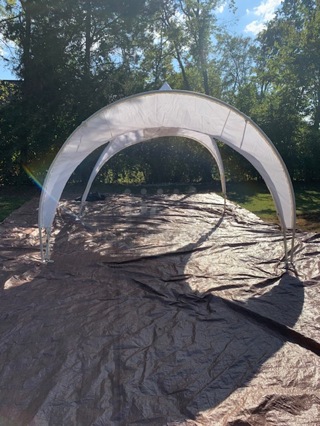 One White Canopy In A Carry Bag. 