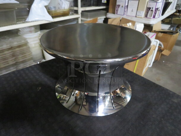 One NEW Vollrath 5 Inch Stainless Steel Hourglass Riser. #46015 - Image 1 of 1