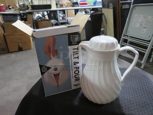 One NEW Vollrath Swirl Serve 64oz Tilt And Pour. - Image 1 of 1
