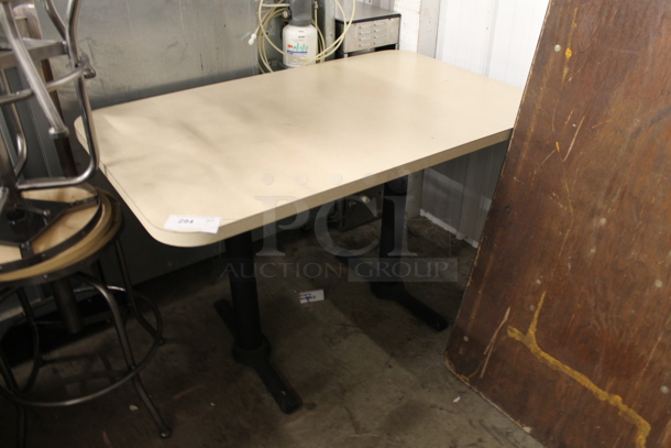 Dining Height Table on 2 Black Metal Table Bases.