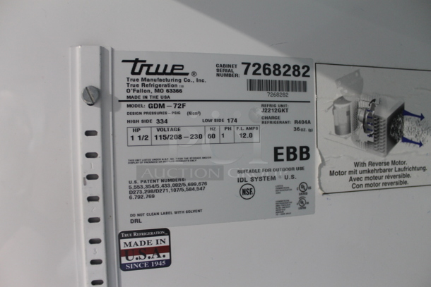 2012 True GDM-72F Commercial Three Swing Door Merchandiser Freezer With Polycoated Racks. 115/208-230V, 1 Phase.  - Image 7 of 7
