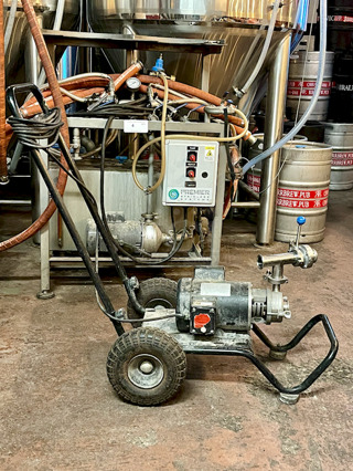 Portable Pump With Tri-Clamp Connection On Brewer's Cart