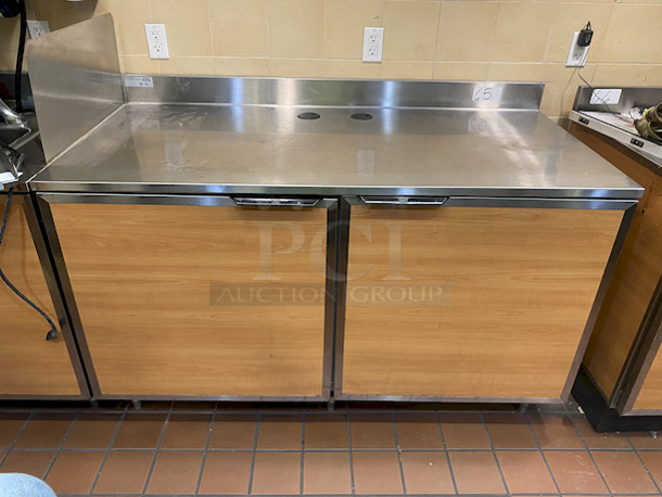 LIKE NEW! Duke SUB-P-60M Storage Cabinet With Stainless Steel Top and Backsplash. Unit Has a 36 inch work height 

WIDTH: 60 DEPTH: 30 HEIGHT: 40-1/2 - Image 1 of 5