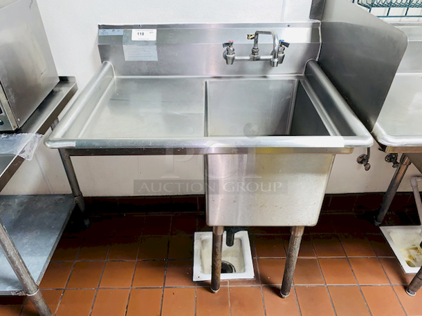 SPRECTACULAR! Duke Manufacturing SDTS-2116-11L Stainless Steel Prep Sink with Left Side Drainboard. 
Condition: 10
Comes complete with faucet. Bowl measures 16 x 21 x 13 inches.

36-1/2x27x44 - Image 1 of 6
