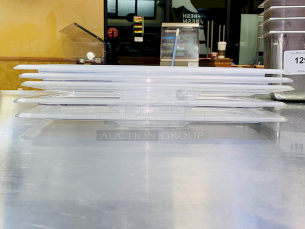 SWEET! Cambro High Temp Amber EN631-1 1/3 Pan Lids.  

5x Your Bid - Image 1 of 4
