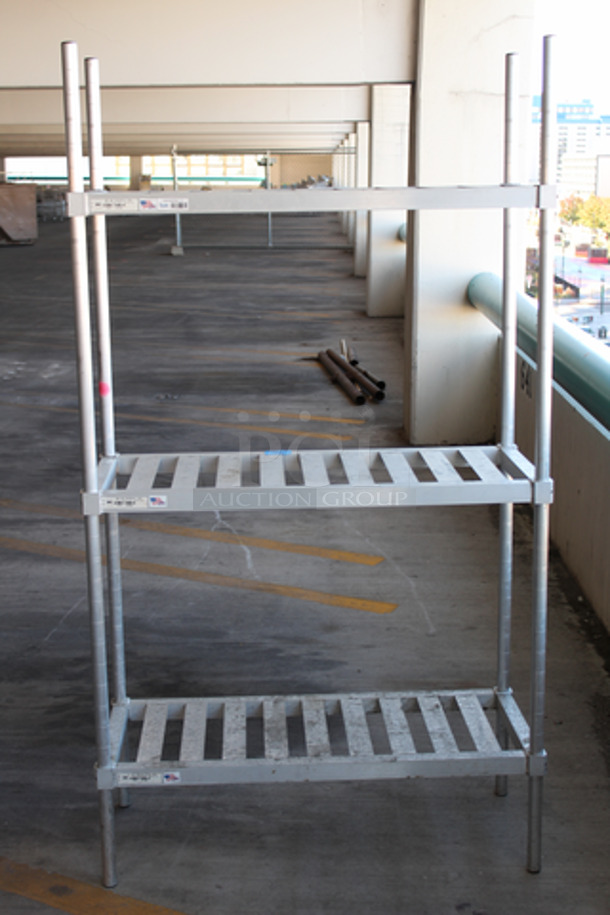 New Age 31842TT7 Keg Storage Rack. 42"W x 18"D x 76"H, (4) 1/2 barrel keg capacity or (12) 1/6 barrel keg capacity, (3) shelves, "T"-Bar shelves, aluminum construction, Made in USA - Image 1 of 3