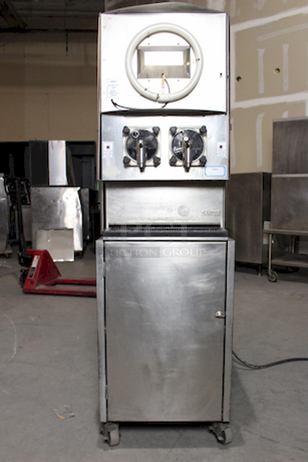 NICE! Lancer FBD500 Frozen Beverage Dispenser, 2 Flavors, On Cabinet With Commercial Casters, 208-230v/60Hz. 
20-1/4x30-1/2x67. Removed From Burger King In Working Order.  - Image 1 of 11