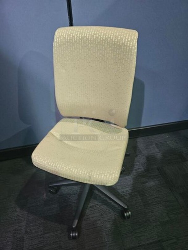 Adjustable AllSteel brand office chairs. No tears or rips, in good used condition! Neutral/ gold upholstery with a black metal frame on wheels. Perfect for training rooms, large offices or anywhere that a larger number of matching seating would be preferred. Measure 44” H x 19”W.  BIDX10 - Image 2 of 3