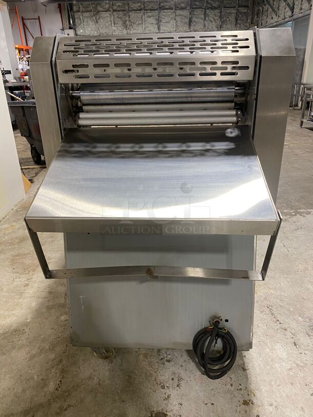 Metal Commercial Floor Style Reversible Dough Sheeter on Commercial Casters.