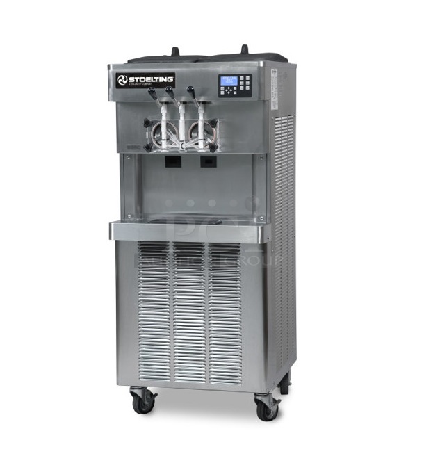 BRAND NEW! 2022 Stoelting O231-30912F Commercial Stainless Steel Air Cooled Soft Serve Ice Cream Machine With 2 Hoppers. Includes Box of Commercial Casters, Operators Manual And Cleaning Supplies. 208-230V, 3 Phase. Tested And Working!  - Image 1 of 12