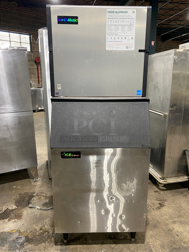 Ice-O-Matic Commercial Ice Making Machine! On Commercial Ice Bin! All Stainless Steel! On Legs! Model: ICE1006HR6 SN: 15051280011676 208/230V 60HZ 1 Phase