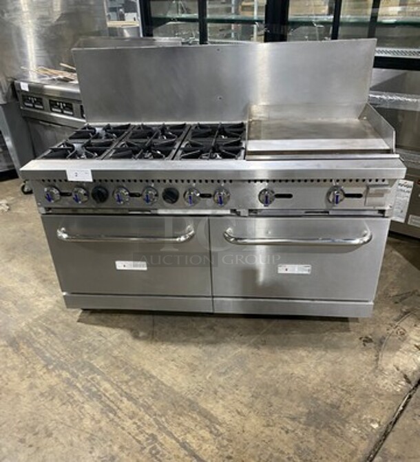 Patriot Commercial Natural Gas Powered 6 Burner Stove With Flat Griddle! Flat Griddle Has Side Splashes! With Raised Back Splash! With 2 Oven Underneath! Metal Oven Racks! All Stainless Steel! On Casters! Model: FMGR6024GNG SN: 17035100006 - Image 1 of 12