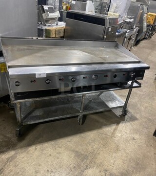 WOW! Garland Heavy Duty Commercial Countertop Gas Powered Flat Griddle! 1 Inch Thick Plate!  With Back And Side Splashes! On Equipment Stand! With Storage Space Underneath! All Stainless Steel! On Casters! Working When Removed!