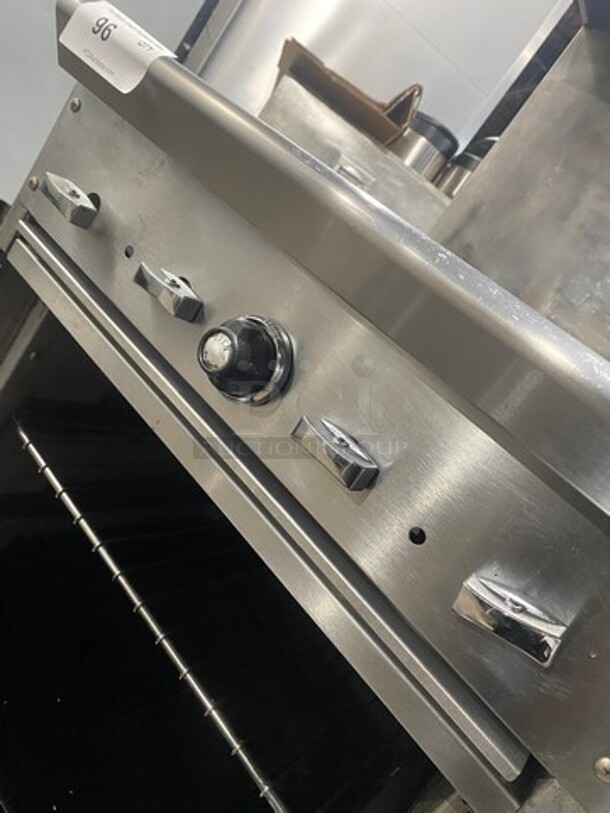 Commercial Natural Gas Powered 4 Burner Stove! With Raised Back Splash! With Oven Underneath! Stainless Steel Body! On Casters! - Image 10 of 11