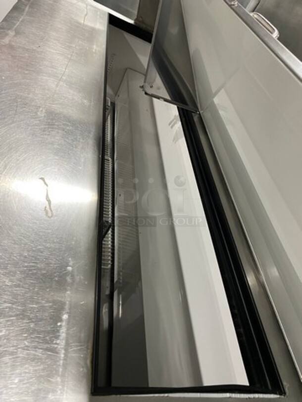 True Commercial Refrigerated Sandwich Prep Table! With 3 Door Storage Space Underneath! Poly Coated Racks! All Stainless Steel! On Casters! Model: TSSU7218 SN: 14477571 115V 60HZ 1 Phase - Image 7 of 9