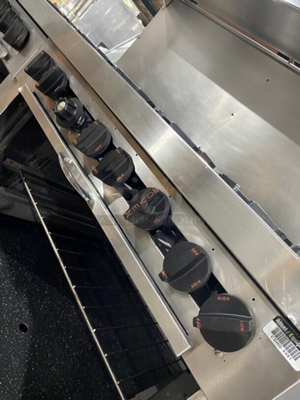 Southbend Commercial Natural Gas Powered 12 Burner Stove! With Raised Back Splash And Salamander Shelf! With 2 Full Size Oven Underneath! All Stainless Steel! On Casters! Working When Removed! - Image 11 of 12