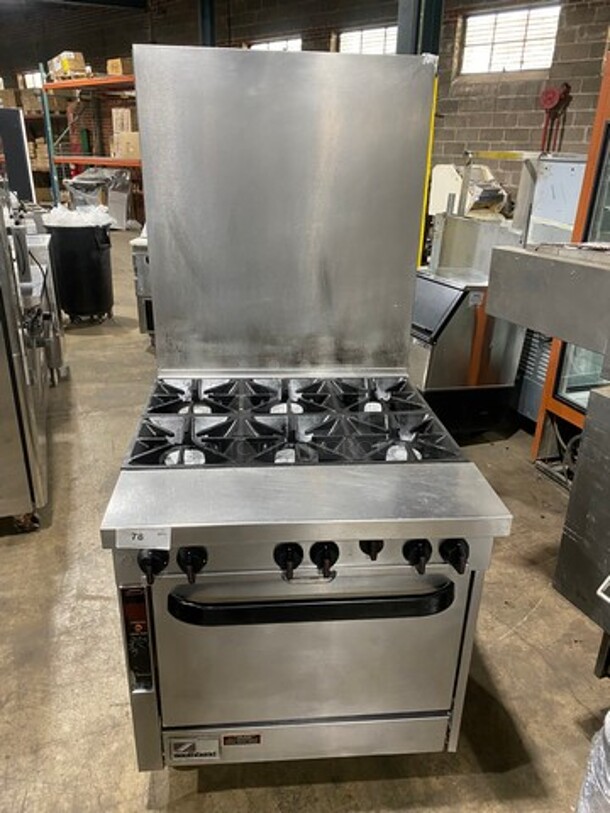 Southbend Commercial Natural Gas Powered 6 Burner Stove! With Raised Back Splash! With Oven Underneath! All Stainless Steel! On Casters! - Image 1 of 11