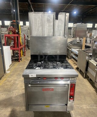 Vulcan Commercial Natural Gas Powered 4 Burner Stove! With Raised Back Splash Double shelf! With Oven Underneath! All Stainless Steel! On Casters!
