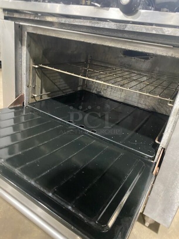 Sunfire Commercial Natural Gas Powered 6 Burner Stove! With Raised Back Splash! With Oven Underneath! All Stainless Steel! Model SX626 Serial 0706100169977! On Legs!
 - Image 7 of 10