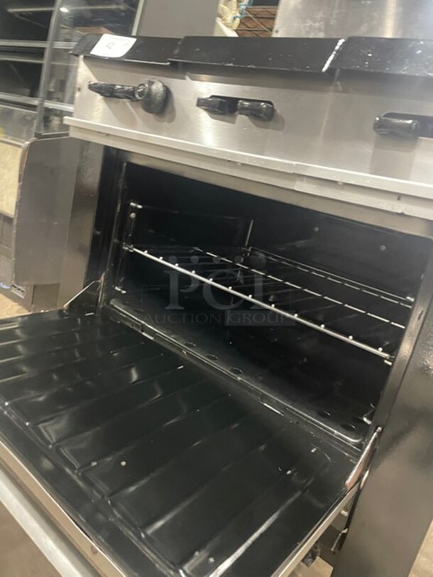 Great! Garland Commercial Natural Gas Powered 6 Burner Stove! With Oven Underneath! All Stainless Steel! With Raised Back Splash! GREAT FOR BIG POTS! On Legs! - Image 7 of 8