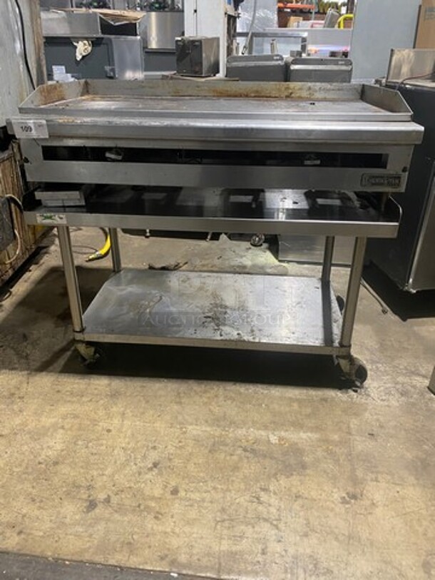Therma Tek Commercial Natural Gas Powered Flat Griddle! With Back & Side Splashes! On Regency Commercial Equipment Stand! With Underneath Storage Space! All Stainless Steel! On Casters! WORKING WHEN REMOVED!